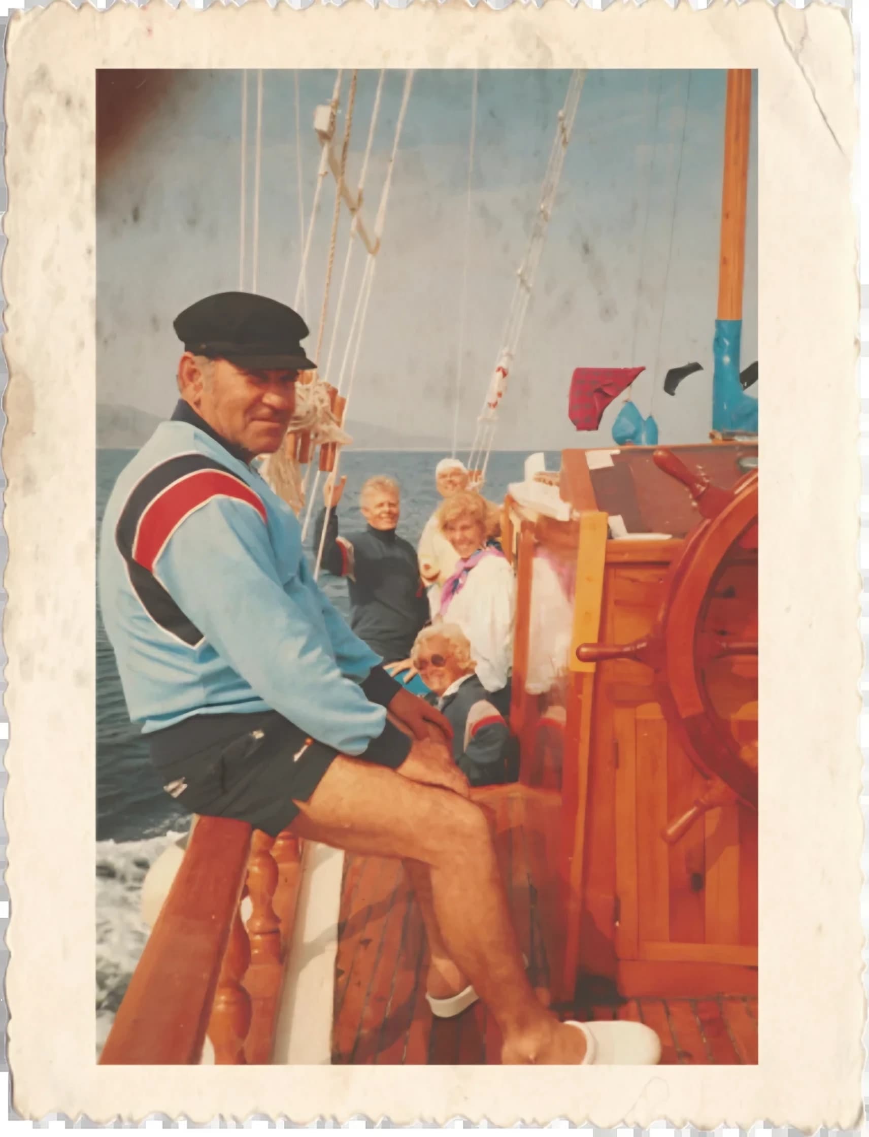 An early voyage from the family album: the captain and guests on the deck of a wooden gulet
